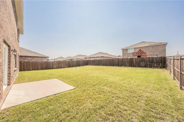 a spacious bathroom with a double vanity sink mirror and toilet