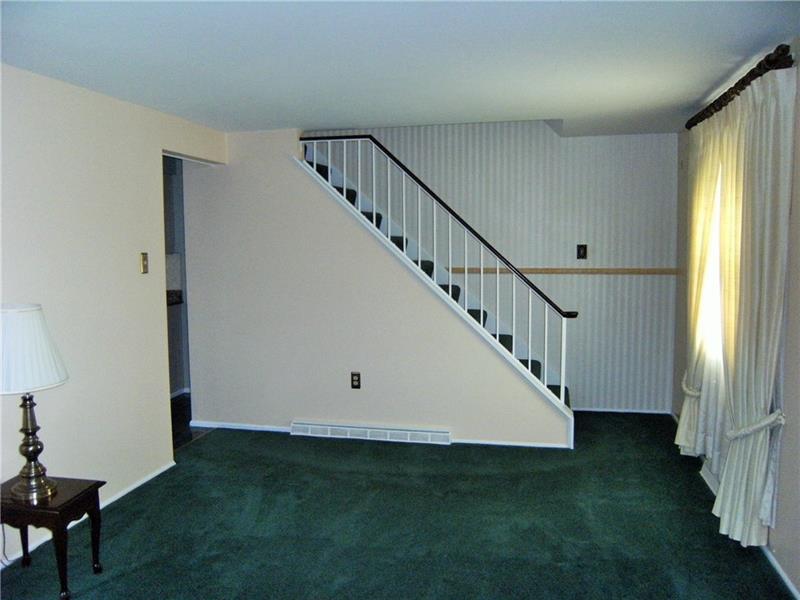 Living Room Looking Towards Rear And Stairs To Second Floor