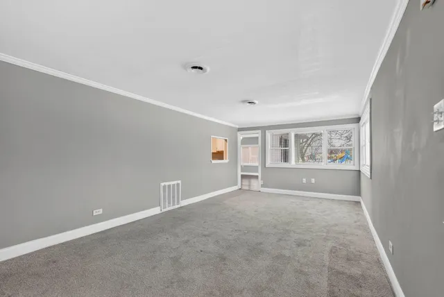 an empty room with windows