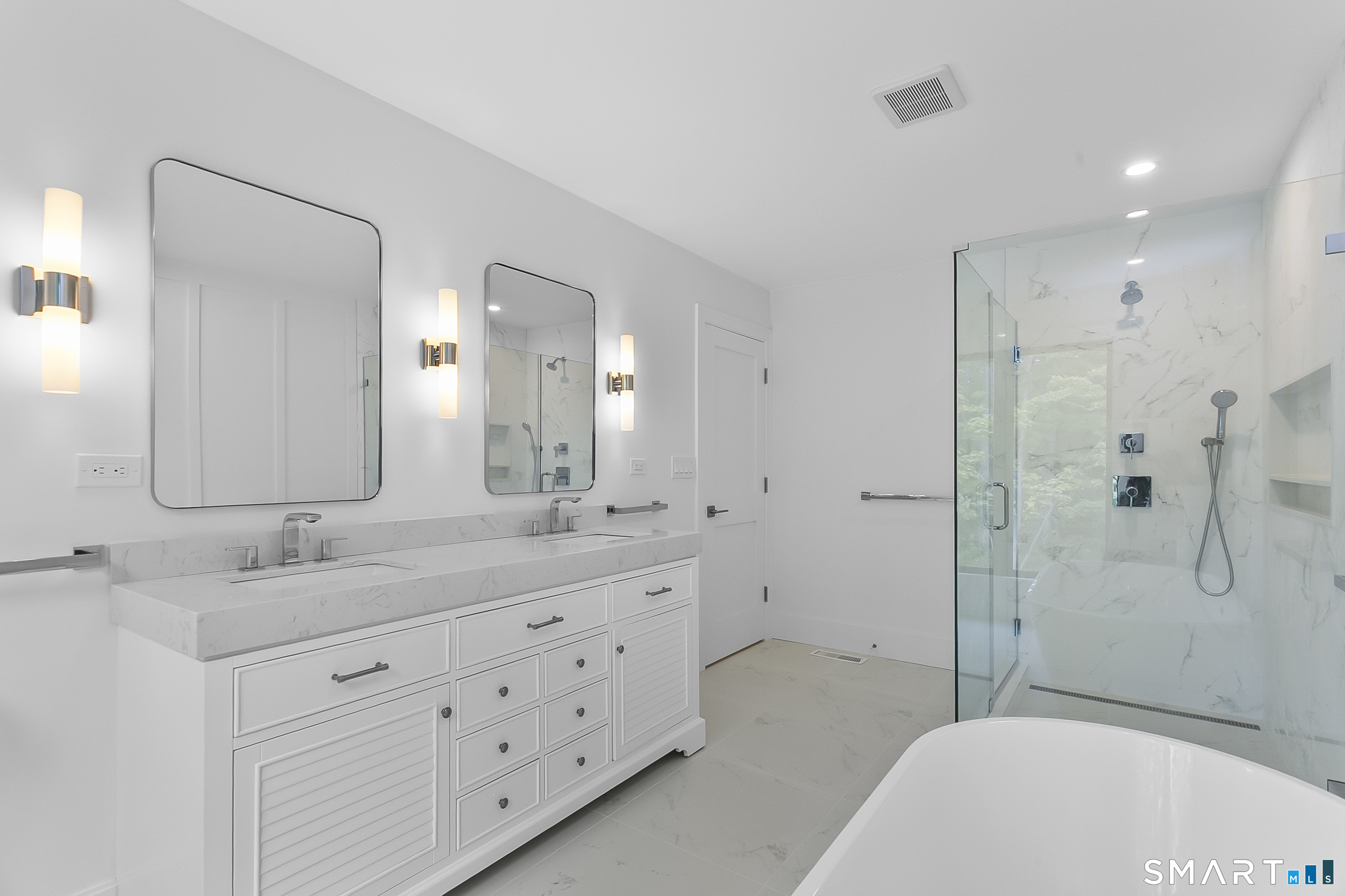80 Oronoque Hills Road Stratford, CT 06614 - Photo 25 of 31 a spacious bathroom with a double vanity sink mirror double and shower