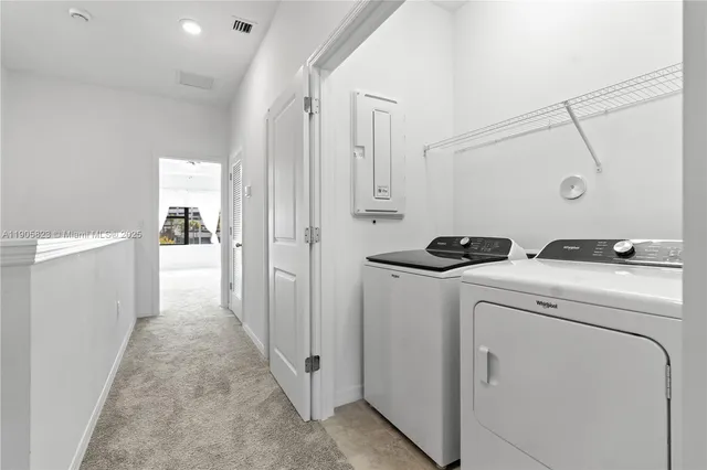 a kitchen with a dining table and chairs