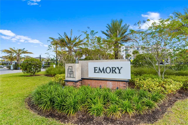 a view of a swimming pool with a table and chairs
