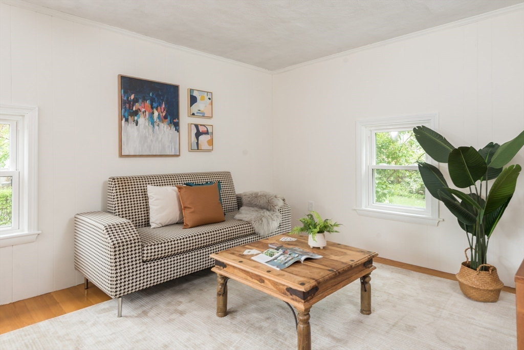 67 Smith Street Arlington, MA 02476 - Photo 15 of 32 a living room with furniture plant and a window