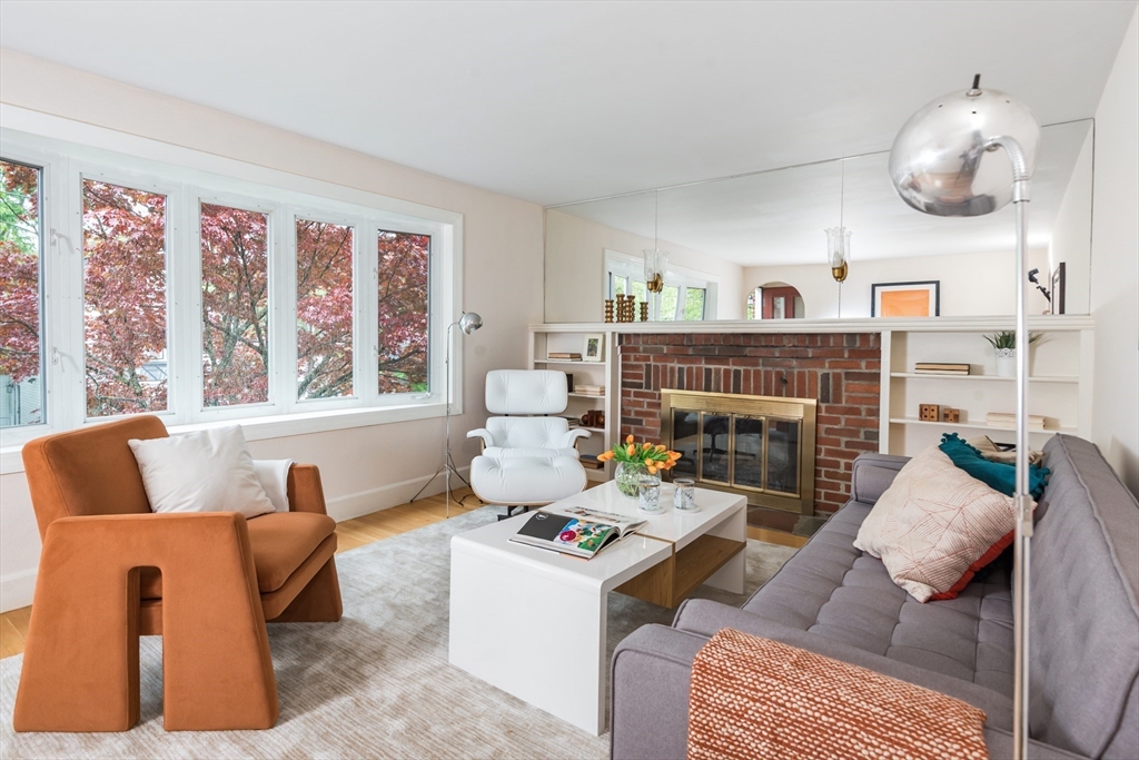 67 Smith Street Arlington, MA 02476 - Photo 2 of 32 a living room with furniture and a fireplace
