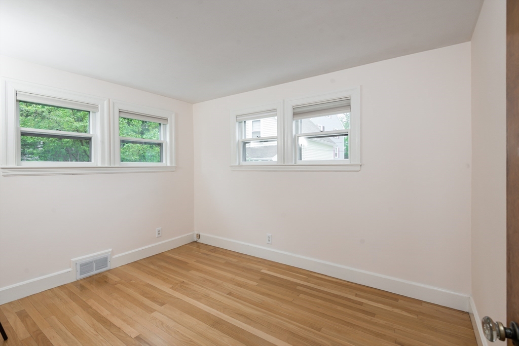 67 Smith Street Arlington, MA 02476 - Photo 23 of 32 an empty room with a window