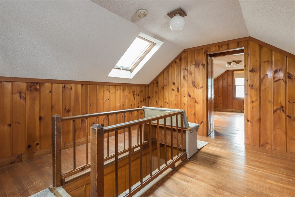 67 Smith Street Arlington, MA 02476 - Photo 25 of 32 a view of entryway with wooden floor