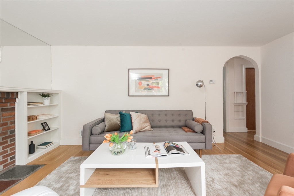 67 Smith Street Arlington, MA 02476 - Photo 4 of 32 a living room with furniture and a rug