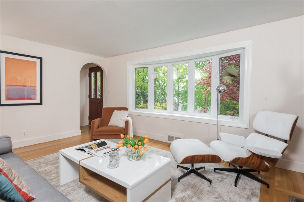 67 Smith Street Arlington, MA 02476 - Photo 5 of 32 a living room with furniture and wooden floor