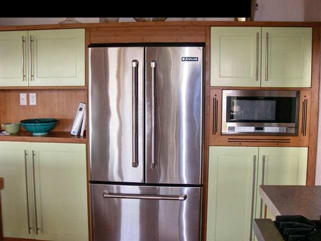 60 South Holokai Road Haiku, HI 96708 - Photo 11 of 30 a kitchen with stainless steel appliances a refrigerator and a stove