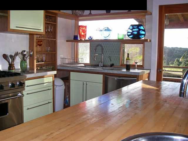 60 South Holokai Road Haiku, HI 96708 - Photo 13 of 30 a kitchen with a sink and cabinets