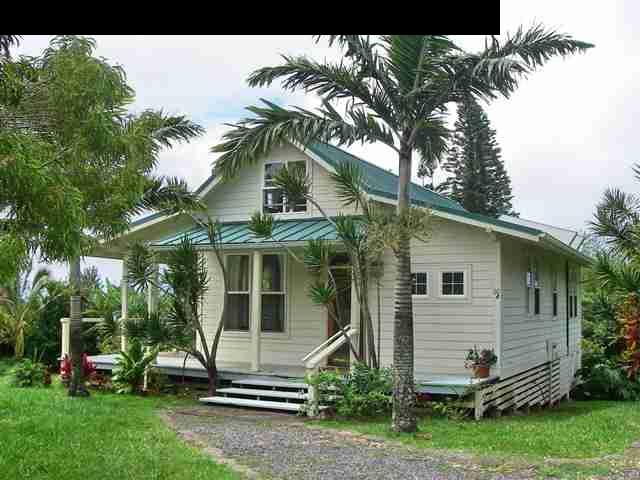 60 South Holokai Road Haiku, HI 96708 - Photo 22 of 30 a view of a white house with a yard and plants