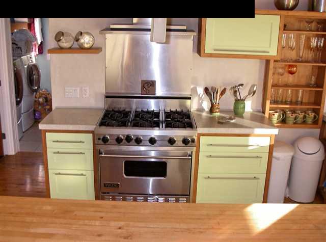 60 South Holokai Road Haiku, HI 96708 - Photo 5 of 30 a kitchen with a stove and a refrigerator