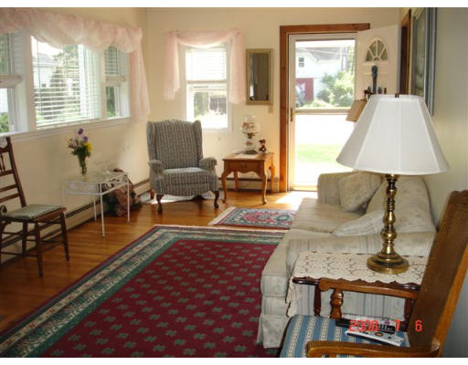 18 Old Bridge Road Bourne, MA 02532 - Photo 7 of 14 a living room with furniture and a table