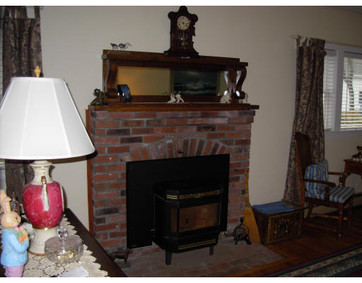 18 Old Bridge Road Bourne, MA 02532 - Photo 9 of 14 a living room with furniture and a fireplace