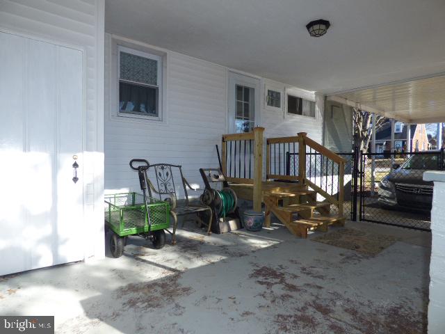 437 Edgehill Road York, PA 17403 - Photo 14 of 19 Oversized Carport with two storage areas.