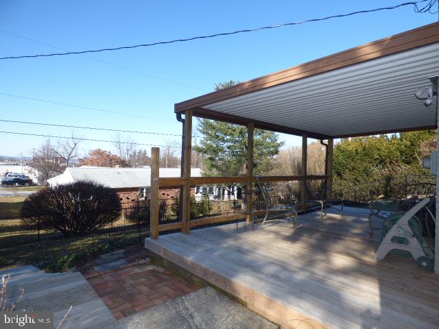 437 Edgehill Road York, PA 17403 - Photo 15 of 19 Covered deck on the rear of property.