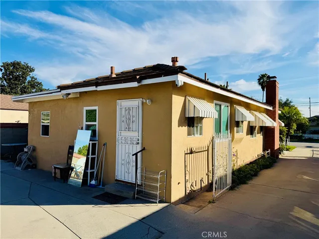 a view of a terrace with wooden fence