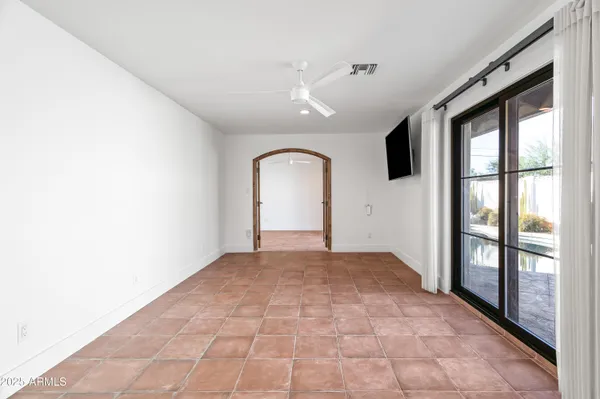 a view of empty room with windows