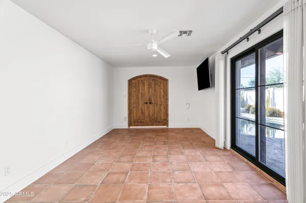 a view of empty room with windows