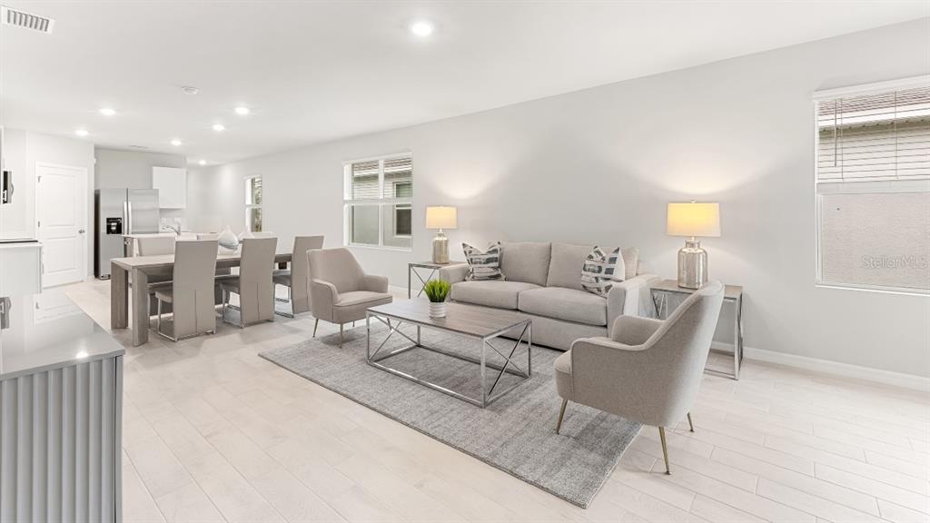 2994 Northeast 21st Ct Road Ocala, FL 34479 - Photo 5 of 9 a living room with furniture and a window