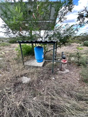 a view of a yard in front of a house