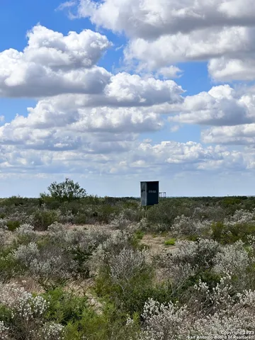 a view of a lake with mountain