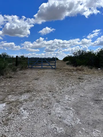 a view of a large pool with a lake view