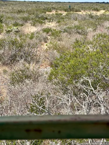 a view of a lake with a big yard