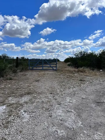 a view of a lake with a big yard