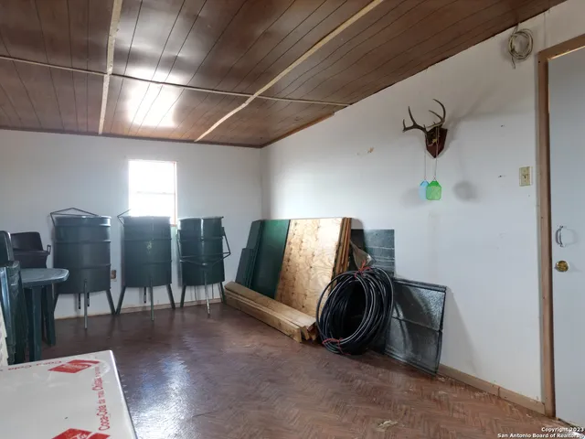 a view of gym equipment and a projector