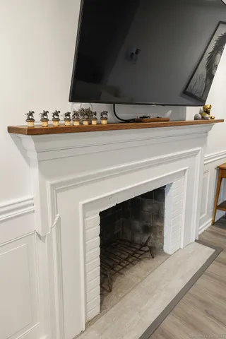 a stove top oven sitting inside of a kitchen