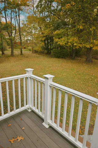 a view of wooden floor with a lake