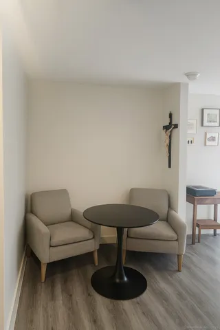 a living room with furniture and a table