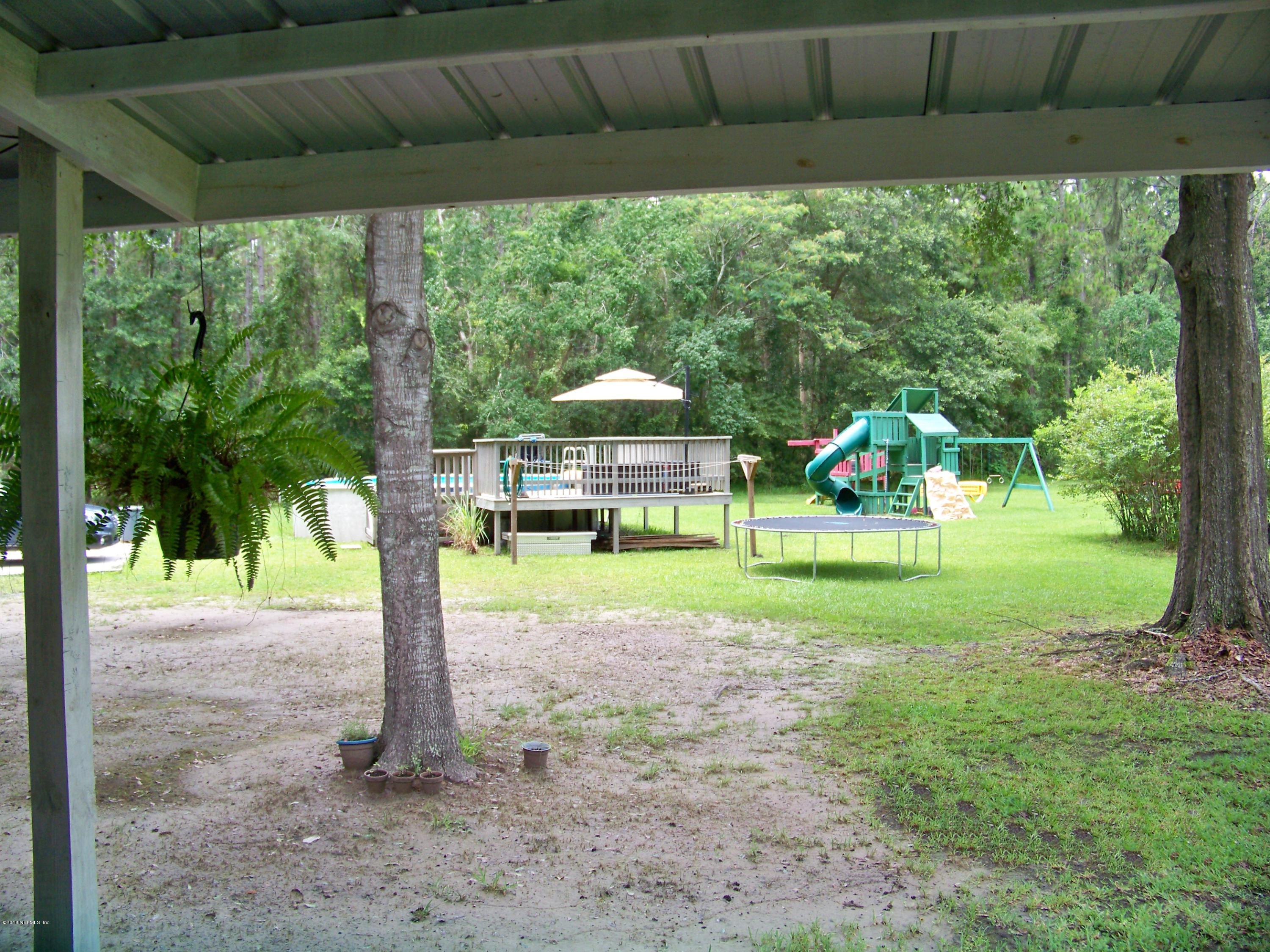 54314 Lawhon Road West Callahan, FL 32011 - Photo 25 of 30 a view of a yard in a backyard