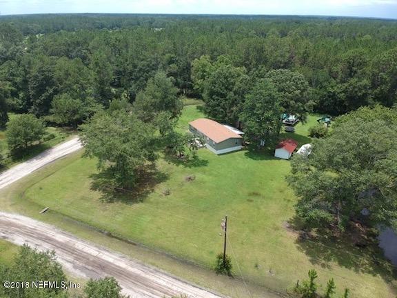 54314 Lawhon Road West Callahan, FL 32011 - Photo 29 of 30 a view of a back yard