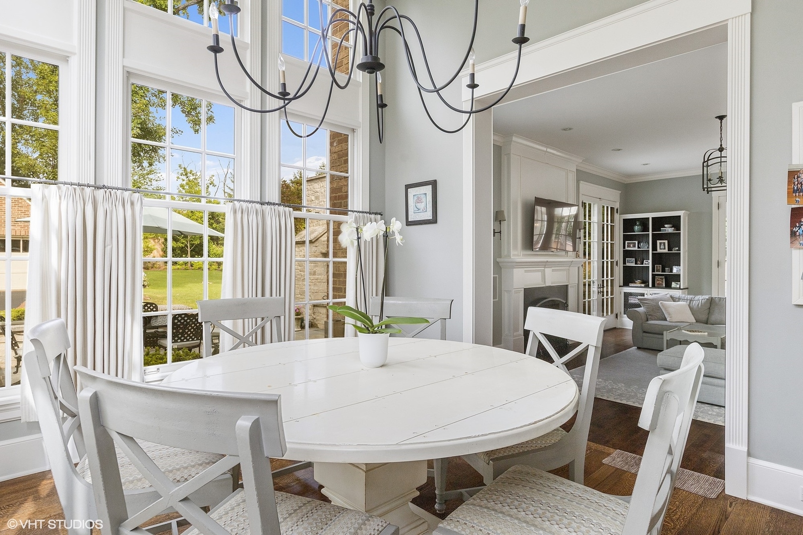 725 Walden Road Winnetka, IL 60093 - Photo 13 of 84 a view of a dining room with furniture window and wooden floor