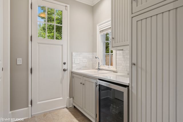 a bedroom with a bed and a flat tv screen
