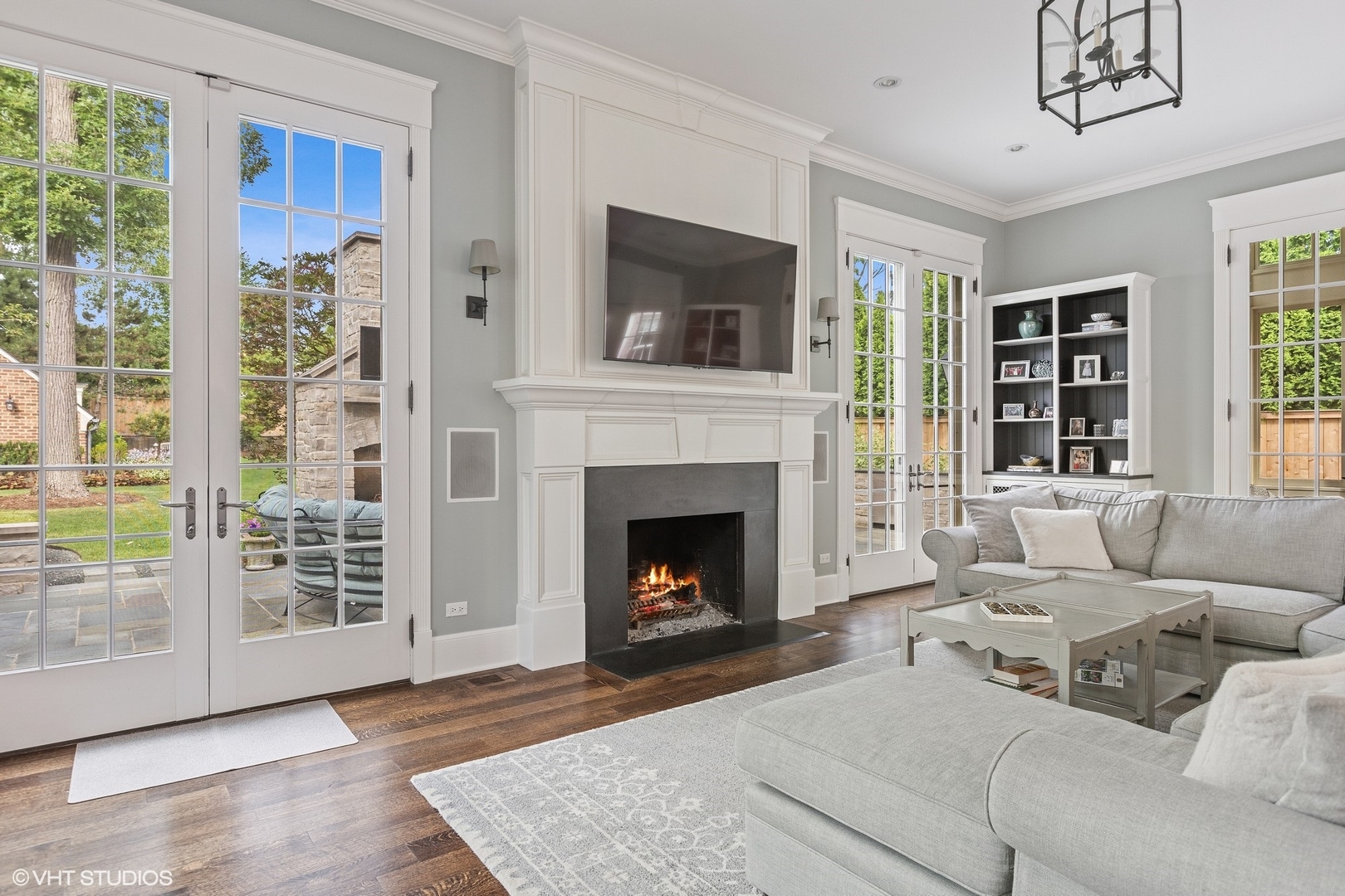 725 Walden Road Winnetka, IL 60093 - Photo 18 of 84 a living room with furniture and a fireplace