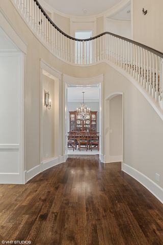 a living room with furniture a fireplace and a window