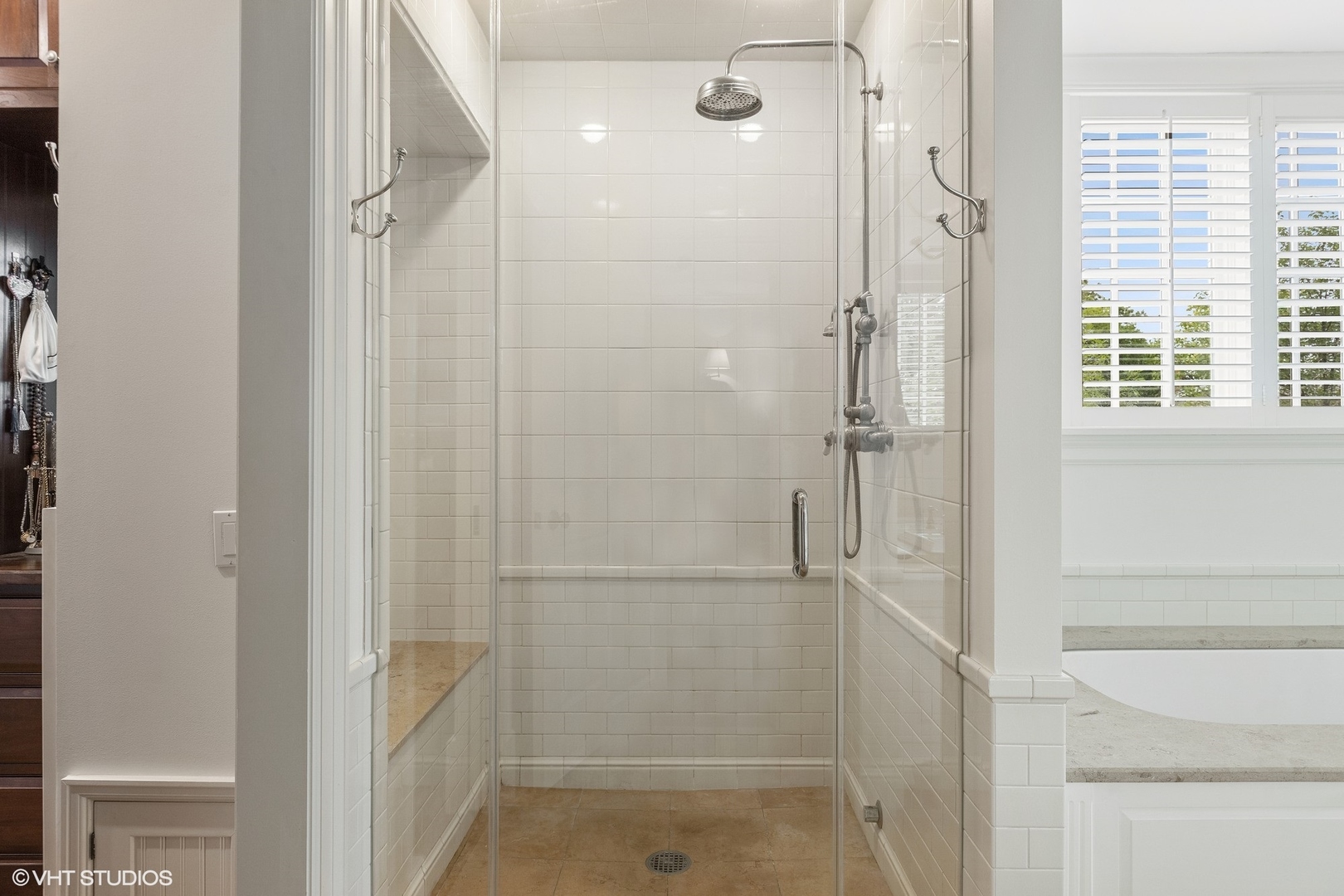 725 Walden Road Winnetka, IL 60093 - Photo 36 of 84 a bathroom with a glass shower door