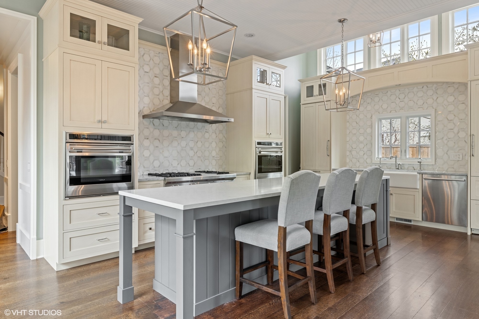 725 Walden Road Winnetka, IL 60093 - Photo 5 of 84 a kitchen with stainless steel appliances a stove a table and chairs