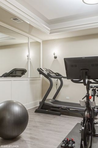 a swimming pool with lots of tress in front of it