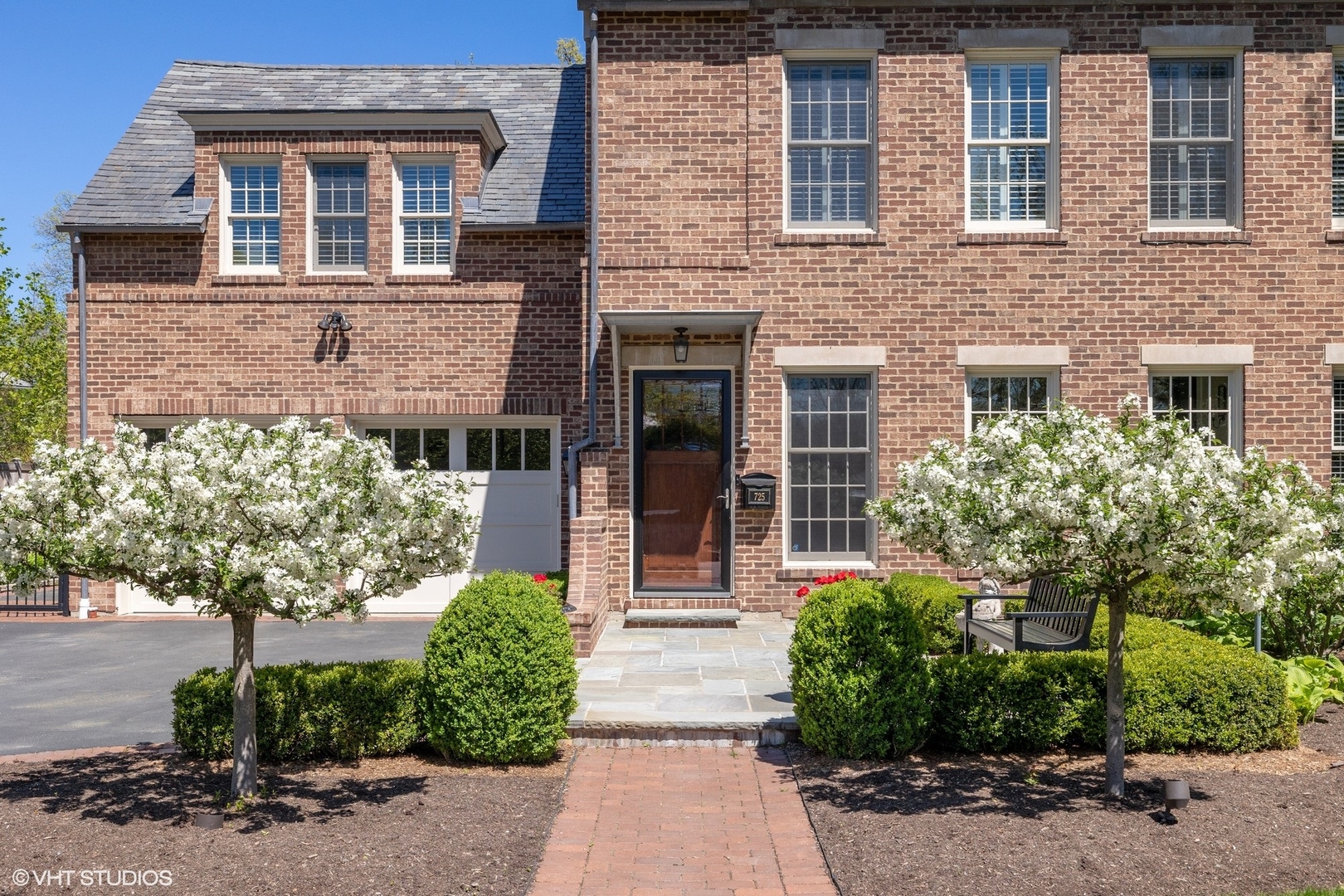 725 Walden Road Winnetka, IL 60093 - Photo 62 of 84 a front view of a house with garden
