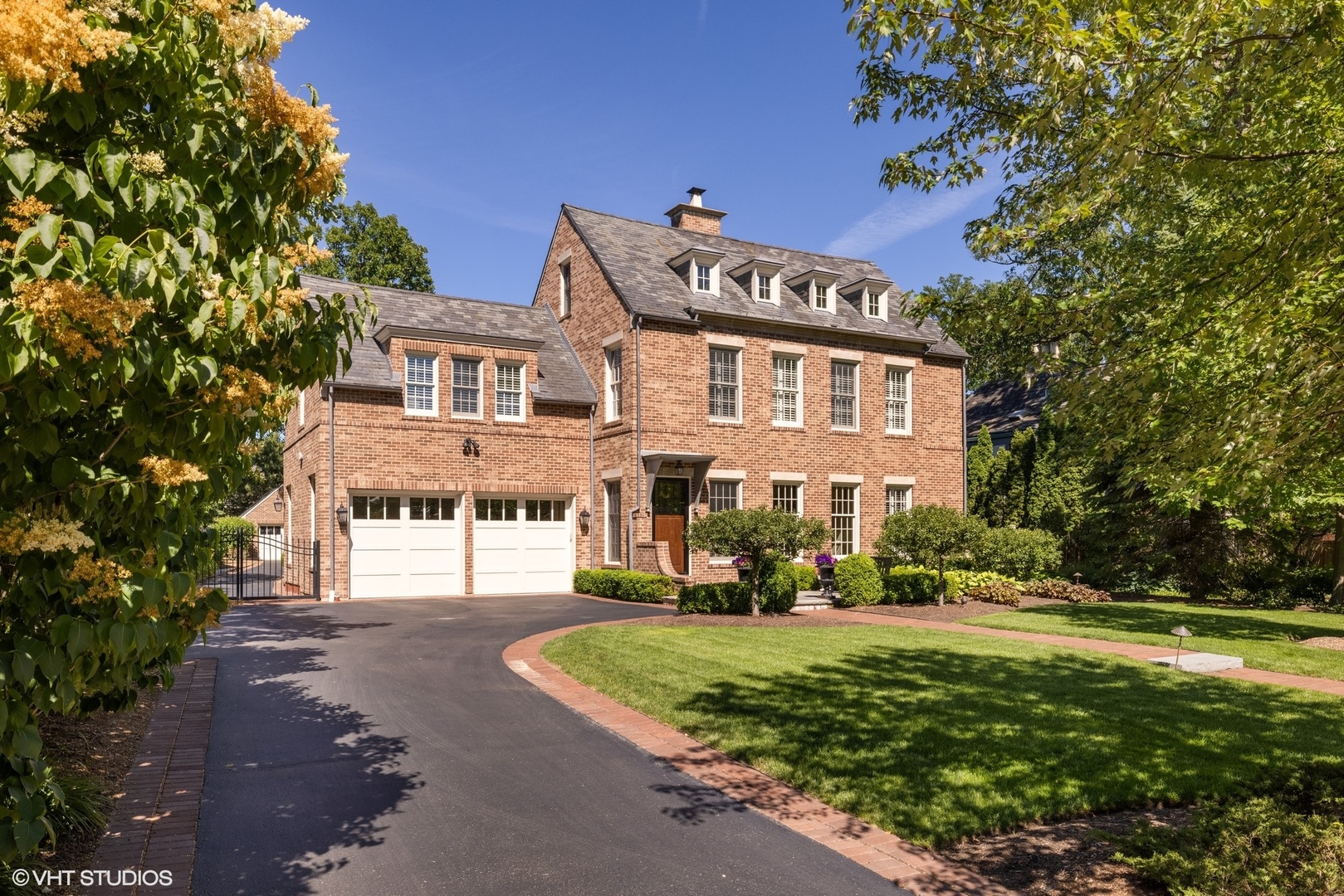 725 Walden Road Winnetka, IL 60093 - Photo 72 of 84 a front view of a house with a yard