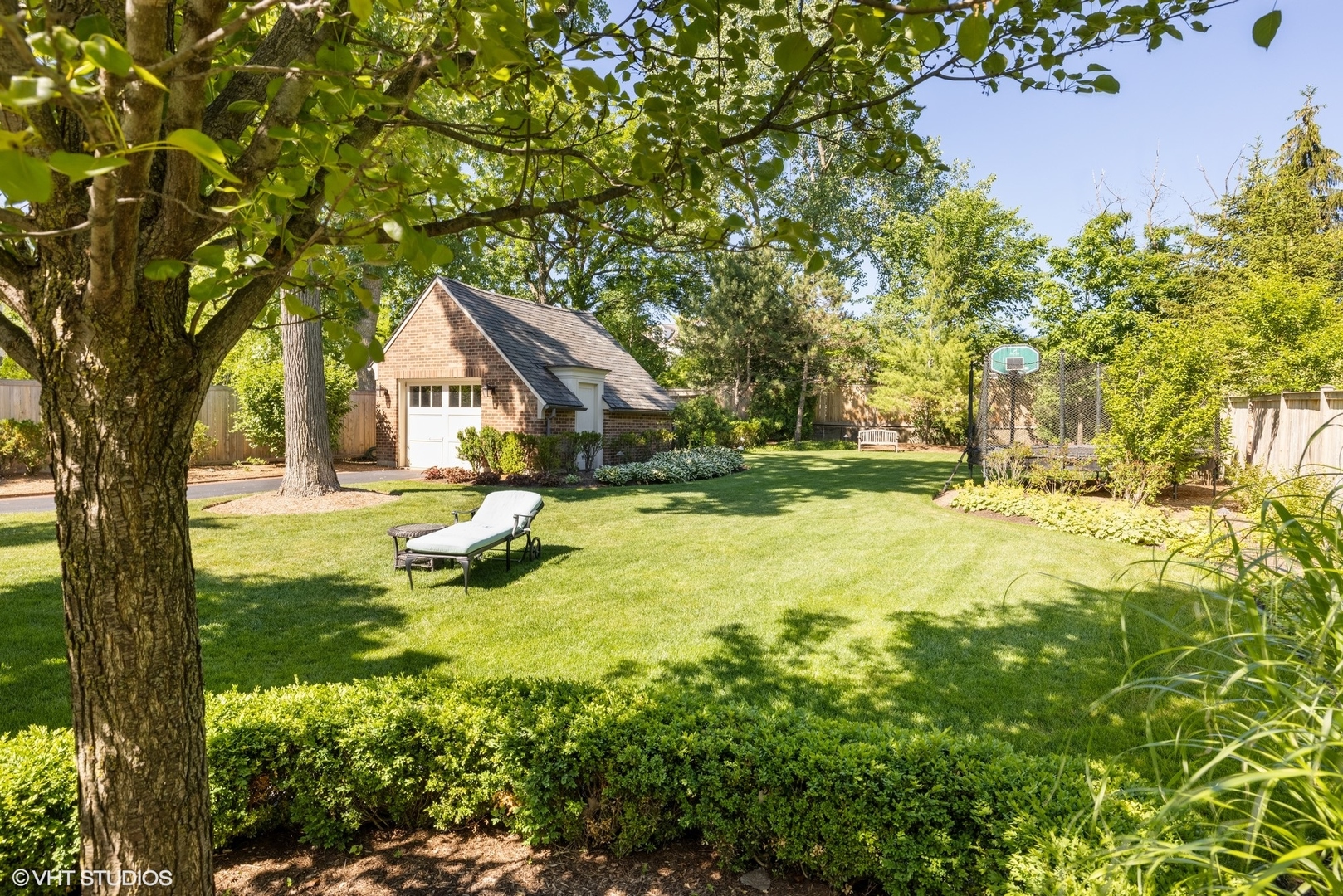 725 Walden Road Winnetka, IL 60093 - Photo 76 of 84 a view of swimming pool with large trees and plants