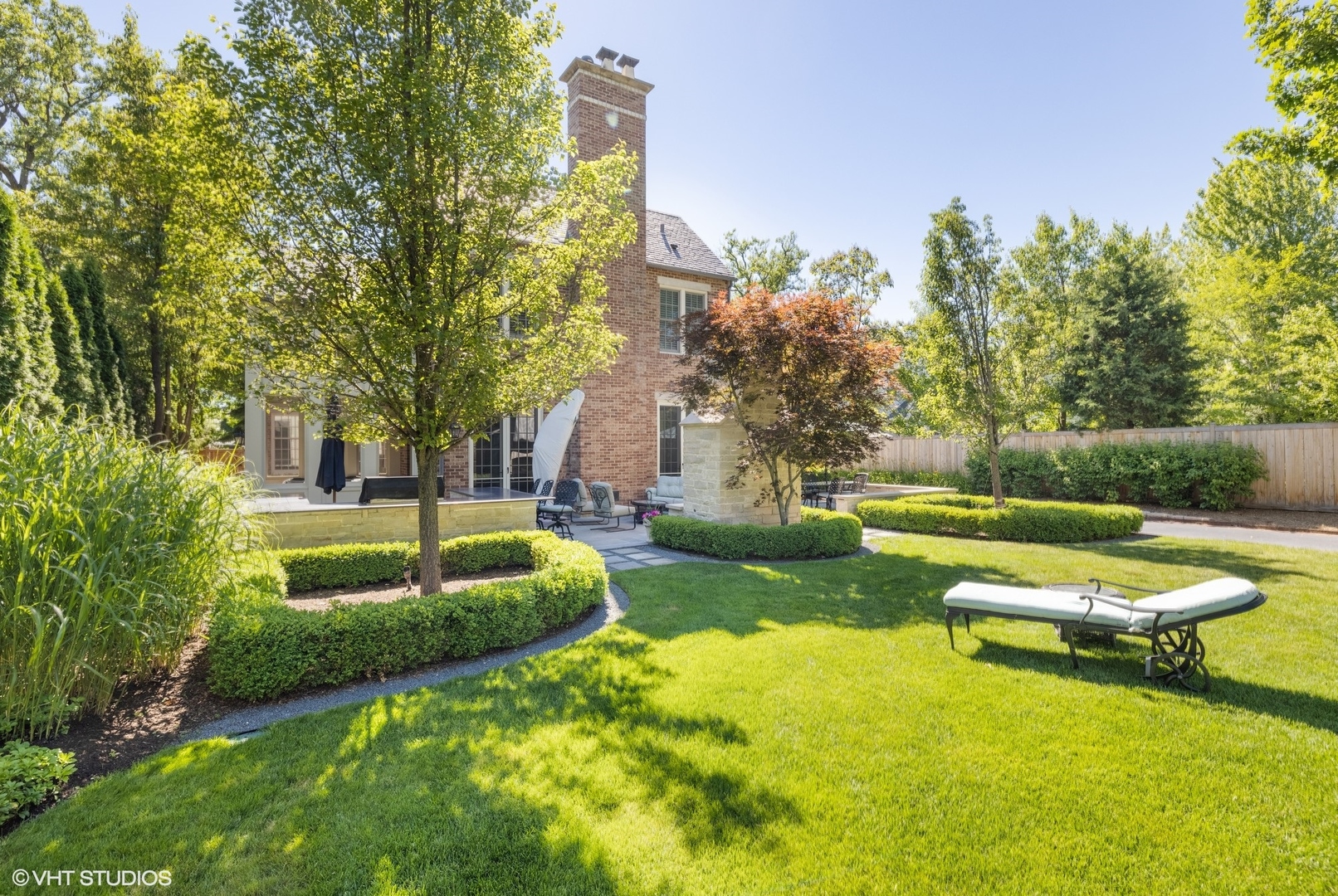 725 Walden Road Winnetka, IL 60093 - Photo 78 of 84 a swimming pool with lots of tress in front of it