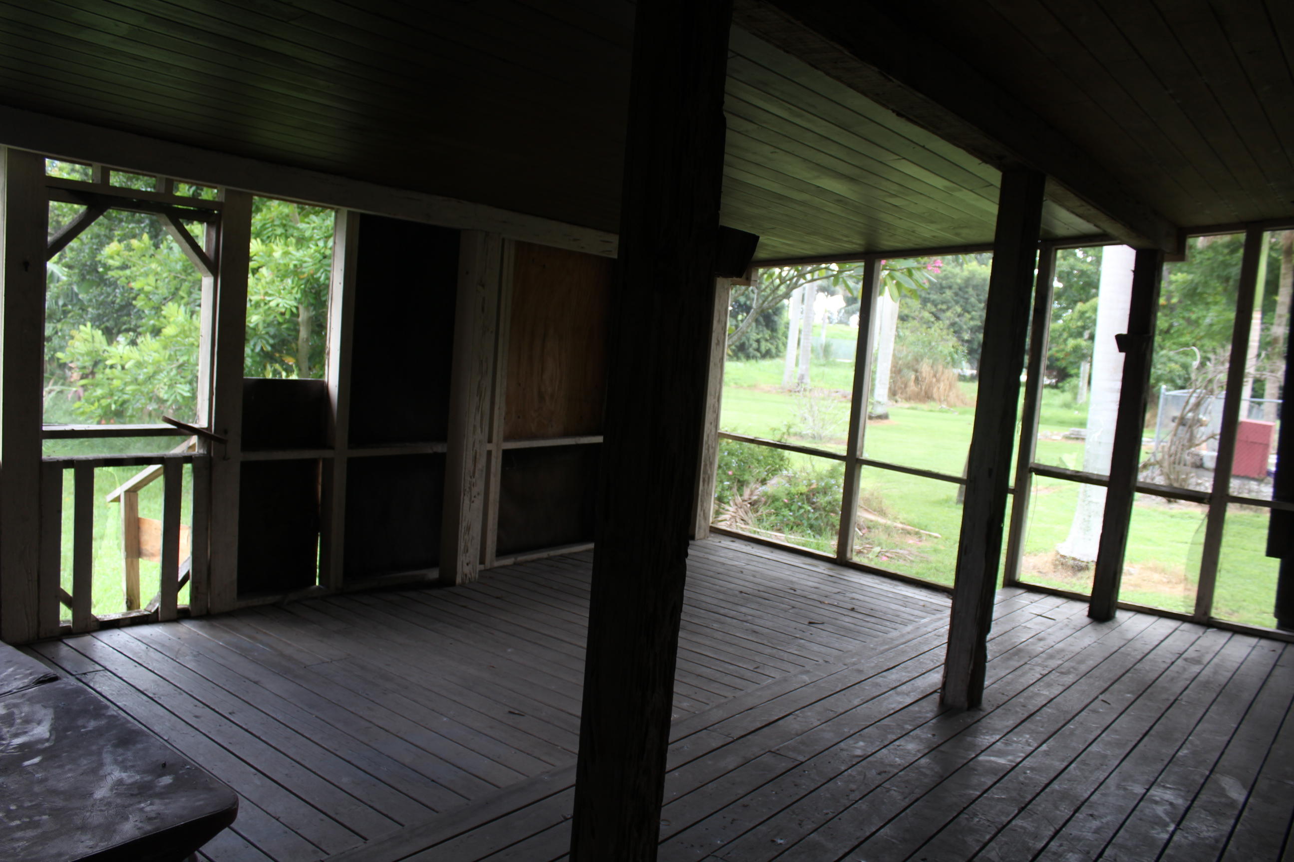 719 Bacom Point Road Pahokee, FL 33476 - Photo 5 of 10 Porch inclosed