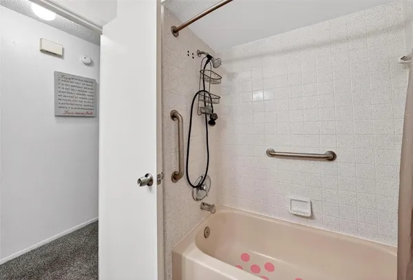 a bathroom with a sink vanity and a mirror