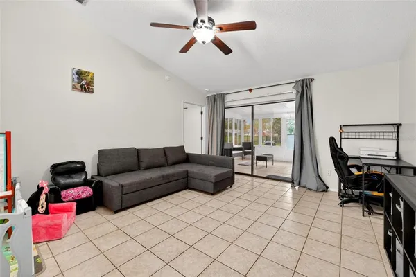 a spacious bedroom with a bed and window