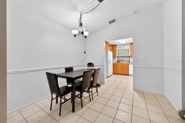 a kitchen with a refrigerator a sink and dishwasher